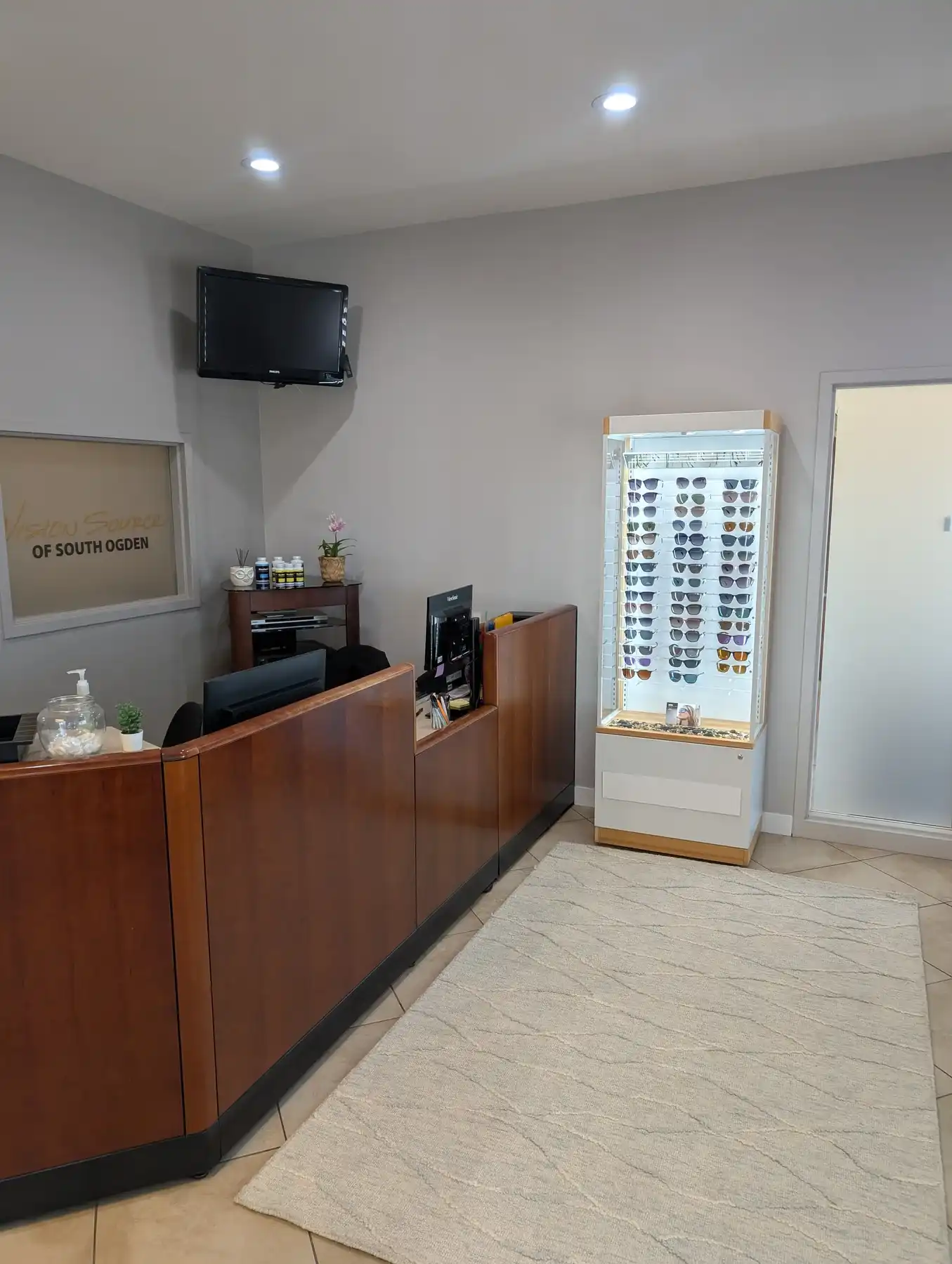Family checking in for an eye exam at Weber Eye Care